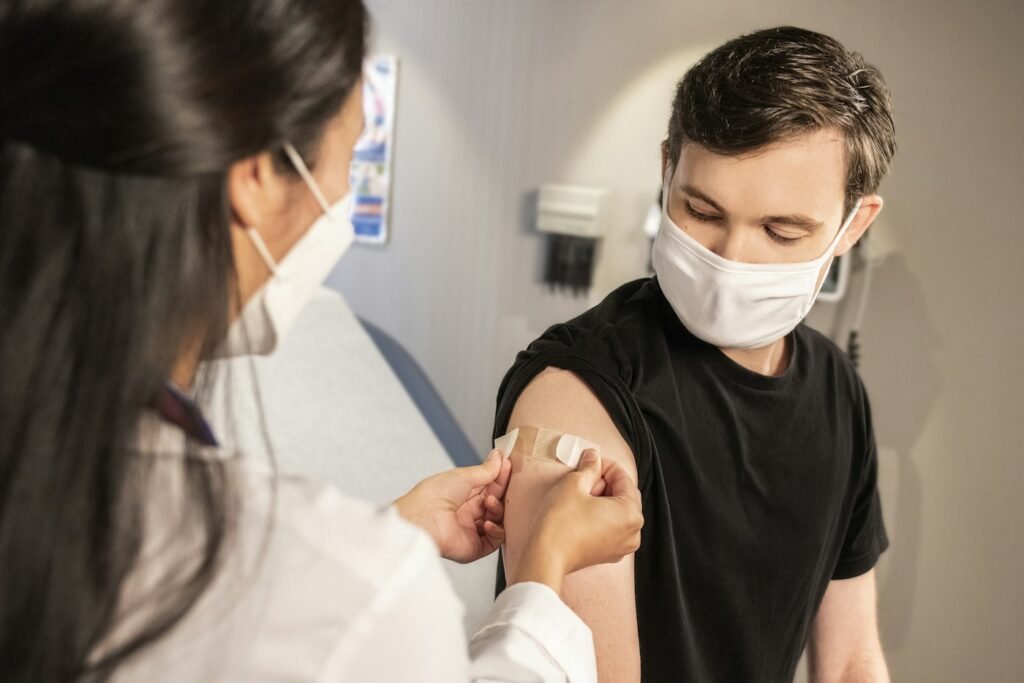 Person using a home blood pressure monitor