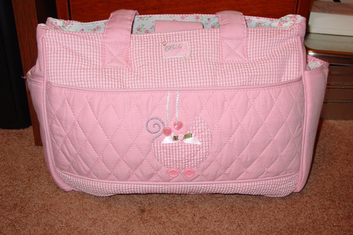 Diaper Bag Essentials: A Practical Packing List by Baby Age